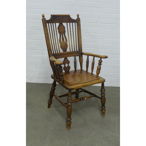 267 - Early 20th century stick back open armchair, 66 x 110 x 45cm.