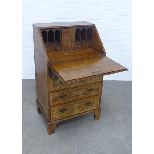 268 - Georgian style walnut and cross banded bureau, with a fall front and fitted interior, pull out slide... 