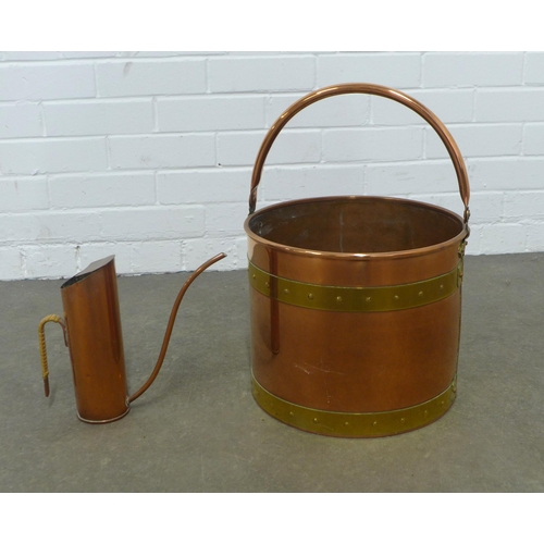 275 - Vintage copper water jug, by Gunnar Ander, together with a copper and brass bound pail (2)