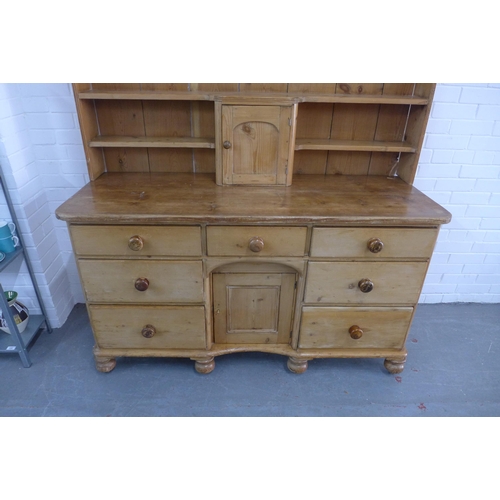 278 - Large antiqued pine dresser, 173 x 199 x 56cm.