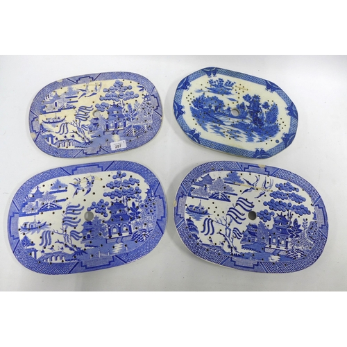 297 - Four 19th century Staffordshire blue and white willow pattern mazarine drainers. (4)