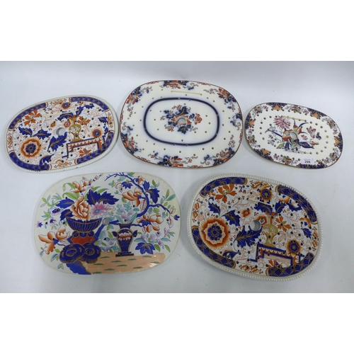 298 - Five 19th century Staffordshire transfer printed Imari pattern mazarine drainers. (5)