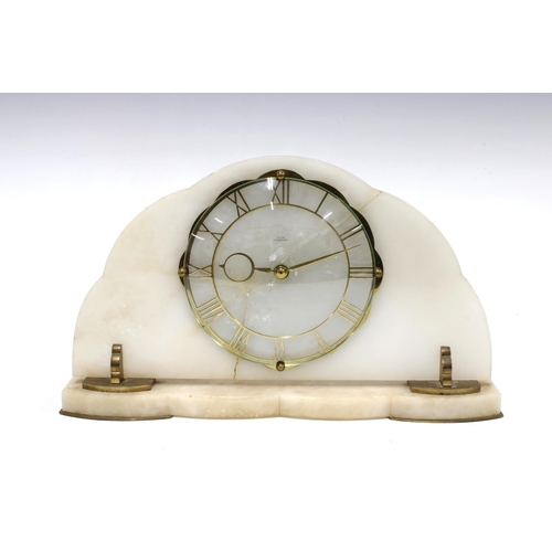 305 - An Art Deco alabaster mantle clock, the dial signed Smiths Tempora, with brass Roman numerals, eight... 