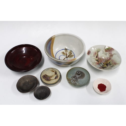 314 - Collection of studio pottery to include bowls and circular boxes with covers , largest bowl 18 x 8cm... 