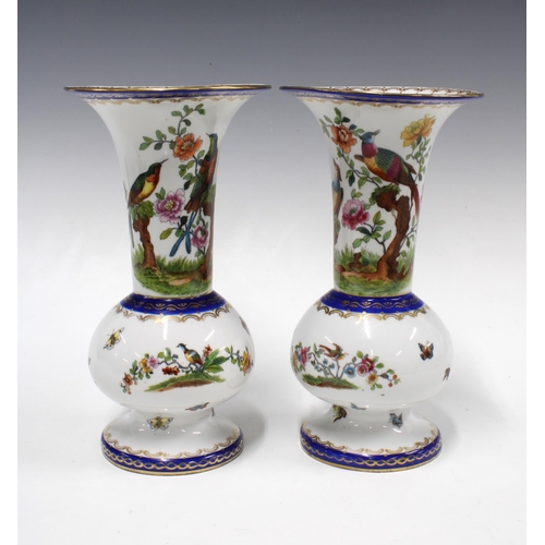 321 - Two continental porcelain vases, painted with birds, 25cm (2)