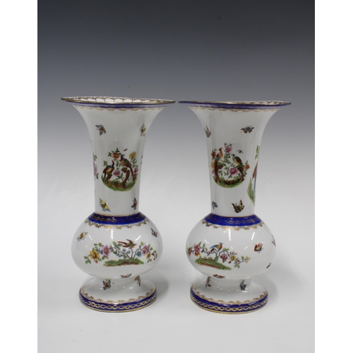 321 - Two continental porcelain vases, painted with birds, 25cm (2)