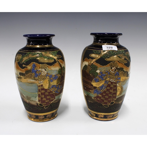 329 - Pair of Japanese earthenware baluster vases, 24cm (2)