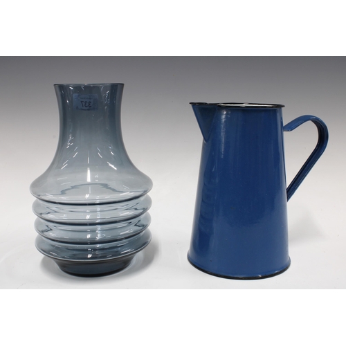 337 - Blue enamel jug, 21cm, together with a grey art glass vase, 24cm (2)