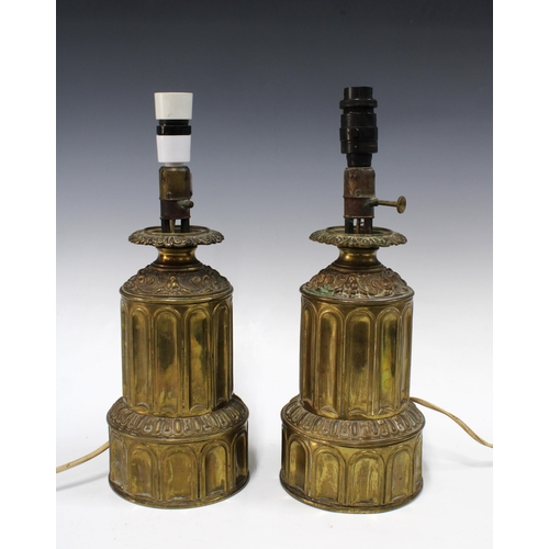 379 - Two brass oil lamp bases converted to electric table lamps, 38cm (2)