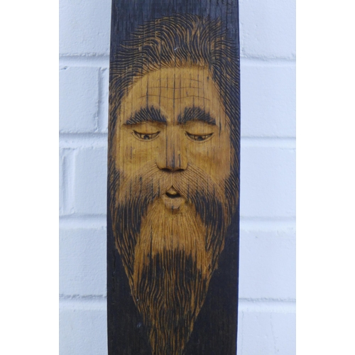 399 - Oak whisky stave carved with a bearded face, 11 x 58cm