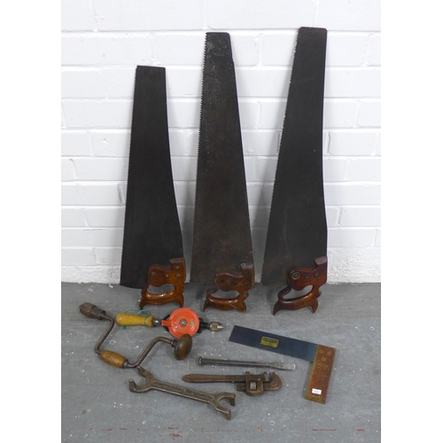 405 - Vintage tools, including three saws, one by H. Diston, Philadelphia longest 77cm