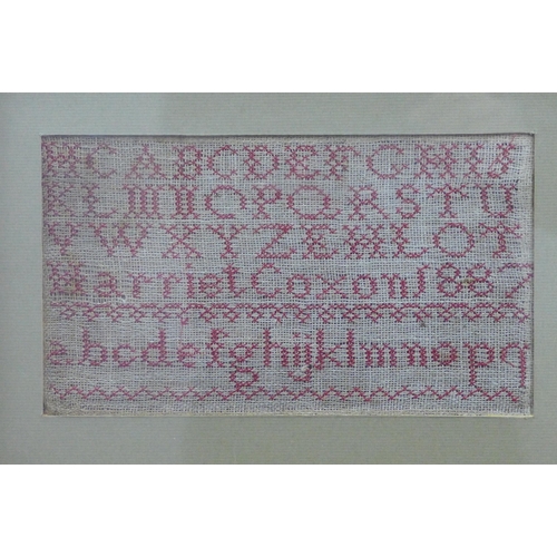 409 - Framed embroidery sampler, God is Love by Charlotte Newsom, 21 x 26cm, together with a Victorian alp... 