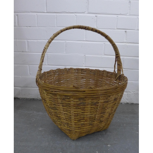 412 - Collection of Thai baskets to include a large rice basket, 46 x 53cm, together with three other smal... 