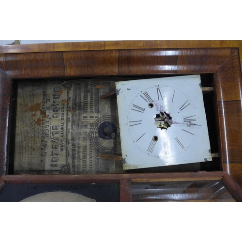 416 - American wall clock with painted glass panel, 39 x 66cm