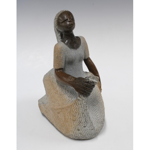 419 - Zimbabwean stoneware sculpture of a seated female, 26cm