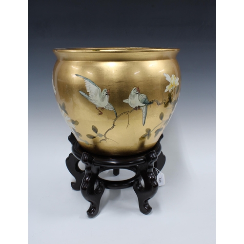 420 - Gold painted floral planter, 36 x 29cm, with a chinoiserie wooden stand