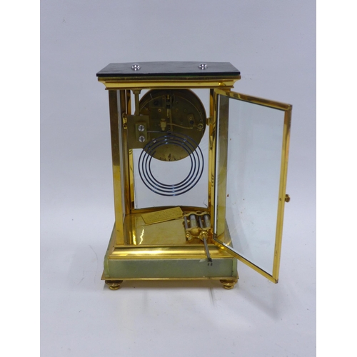 428 - Edwardian mantle clock, striking on a gong with a twin-tube mercury pendulum, 17 x 27 x 14cm.