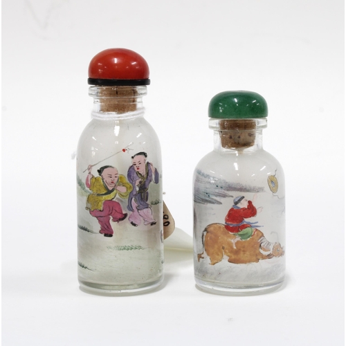 435 - Two Chinese painted glass snuff bottles, 8cm. (2)