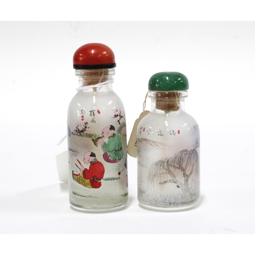 435 - Two Chinese painted glass snuff bottles, 8cm. (2)