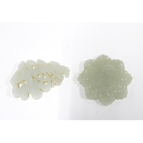 436 - Two carved jadeite panels, 9cm. (2)