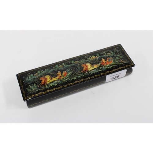 438 - Russian black lacquered box and cover, 19 x 5.5cm.