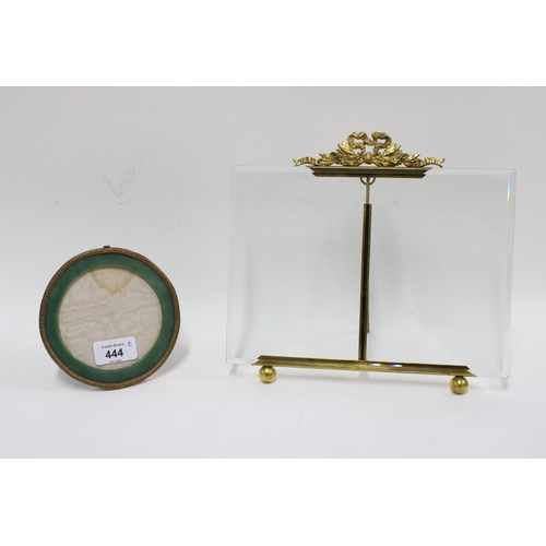 444 - Rectangular glass frame with a gilt metal ribbon surmount and a smaller circular, 25 x 23cm. (2)