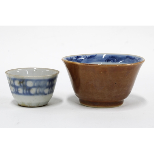 447 - A Chinese Batavian cafe au lait glazed tea bowl and a smaller Chinese tea bowl, 8cm. (2)