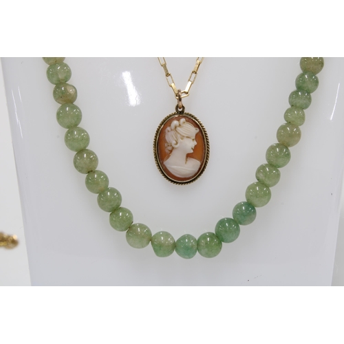 61 - 9ct gold chain necklace with an unmarked Cameo pendant together with a strand of jade beads