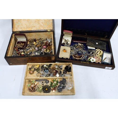 65 - Two mahogany boxes, each containing a quantity of vintage and later costume jewellery to include som... 