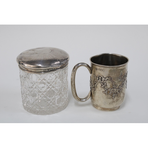 68 - An Edwardian silver Christening mug, London 1906 together with a silver topped glass jar, 10cm (2)