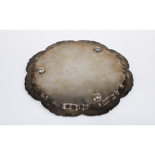 79 - George Vi silver tray, circular outline with scrolling floral edge, engraved initial to centre, on t... 