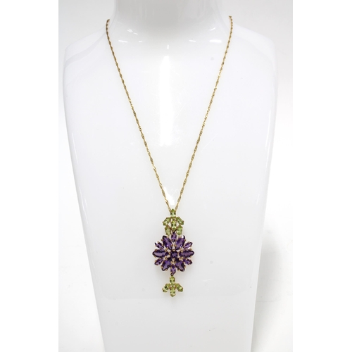 8 - 10ct gold gemset flower pendant on chain, stampd 10K