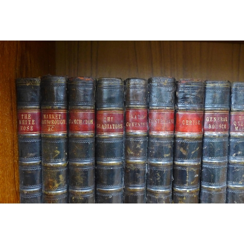 459 - Two sets of leather bound classic fiction books, 18cm