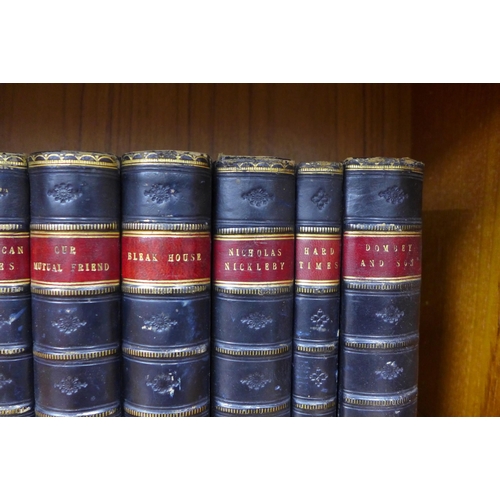 459 - Two sets of leather bound classic fiction books, 18cm