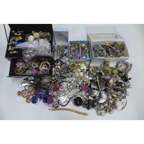 90B - A quantity of costume and silver jewellery.