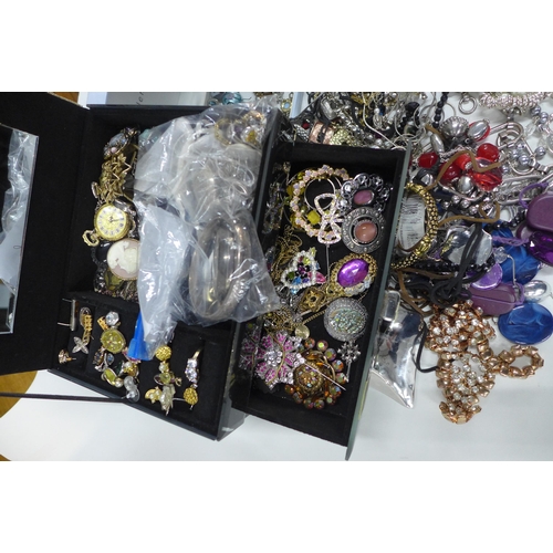 90B - A quantity of costume and silver jewellery.