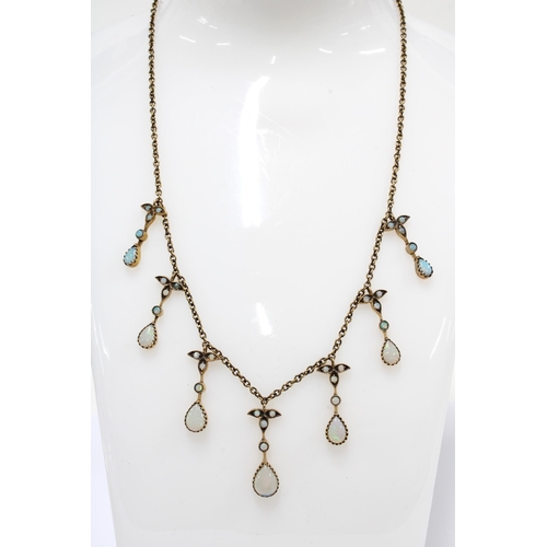 103 - 9ct gold opal cabochon and teardrop necklace, stamped 375