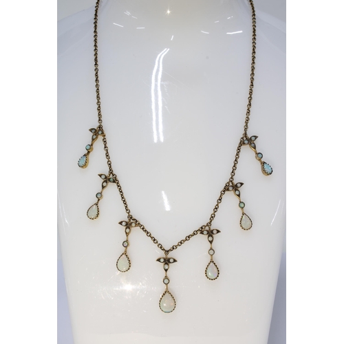 103 - 9ct gold opal cabochon and teardrop necklace, stamped 375