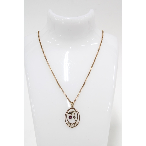 114 - Edwardian seed pearl pendant on a 9ct gold chain