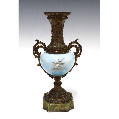 121 - French style bronze patinated spelter vase with porcelain body, on a green hardstone base, 28cm