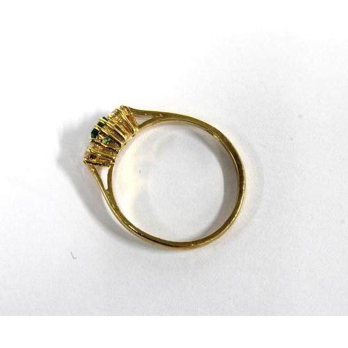 13 - 18ct gold diamond and emerald three stone ring, London 1990