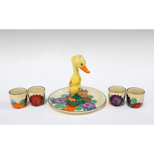 140 - Clarice Cliff Bizarre duck cruet stand in the Gayday pattern, with four Fantasque egg cups, 13cm