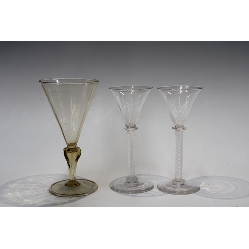 158 - Two 19th century opaque twist stem wine glasses, 14cm, together with an amber tinted Facon de Venise... 