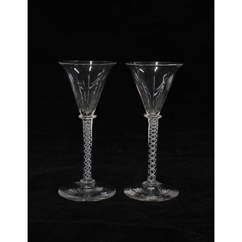 158 - Two 19th century opaque twist stem wine glasses, 14cm, together with an amber tinted Facon de Venise... 