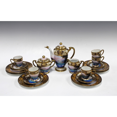 165 - Noritake  porcelain coffee set, handpainted with a lake and swans, with mountains in the distance, w... 