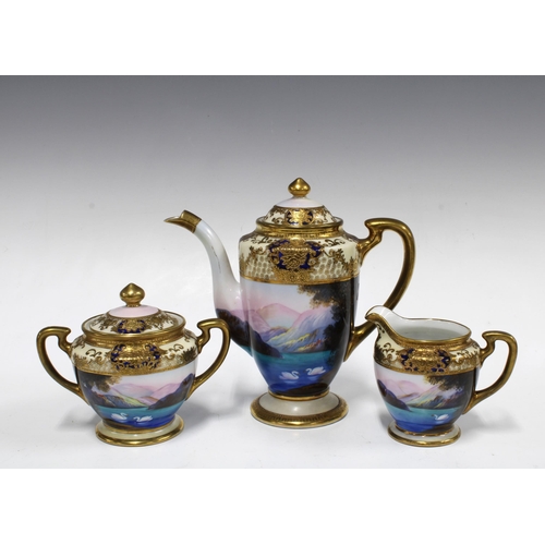 165 - Noritake  porcelain coffee set, handpainted with a lake and swans, with mountains in the distance, w... 