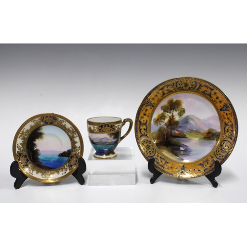 165 - Noritake  porcelain coffee set, handpainted with a lake and swans, with mountains in the distance, w... 