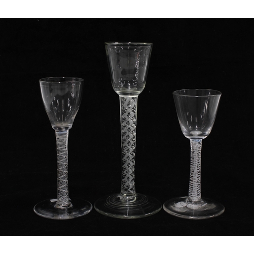 166 - Three Georgian opaque twist stem cordial glasses, tallest 17.5cm (3)