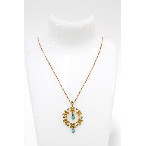 18 - Turquoise pendant with seed pearls, set in yellow metal suspended on a chain stamped 18k