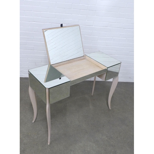 228 - Contemporary mirrored glass dressing table,  the middle section lifting to form a dressing mirror, o... 